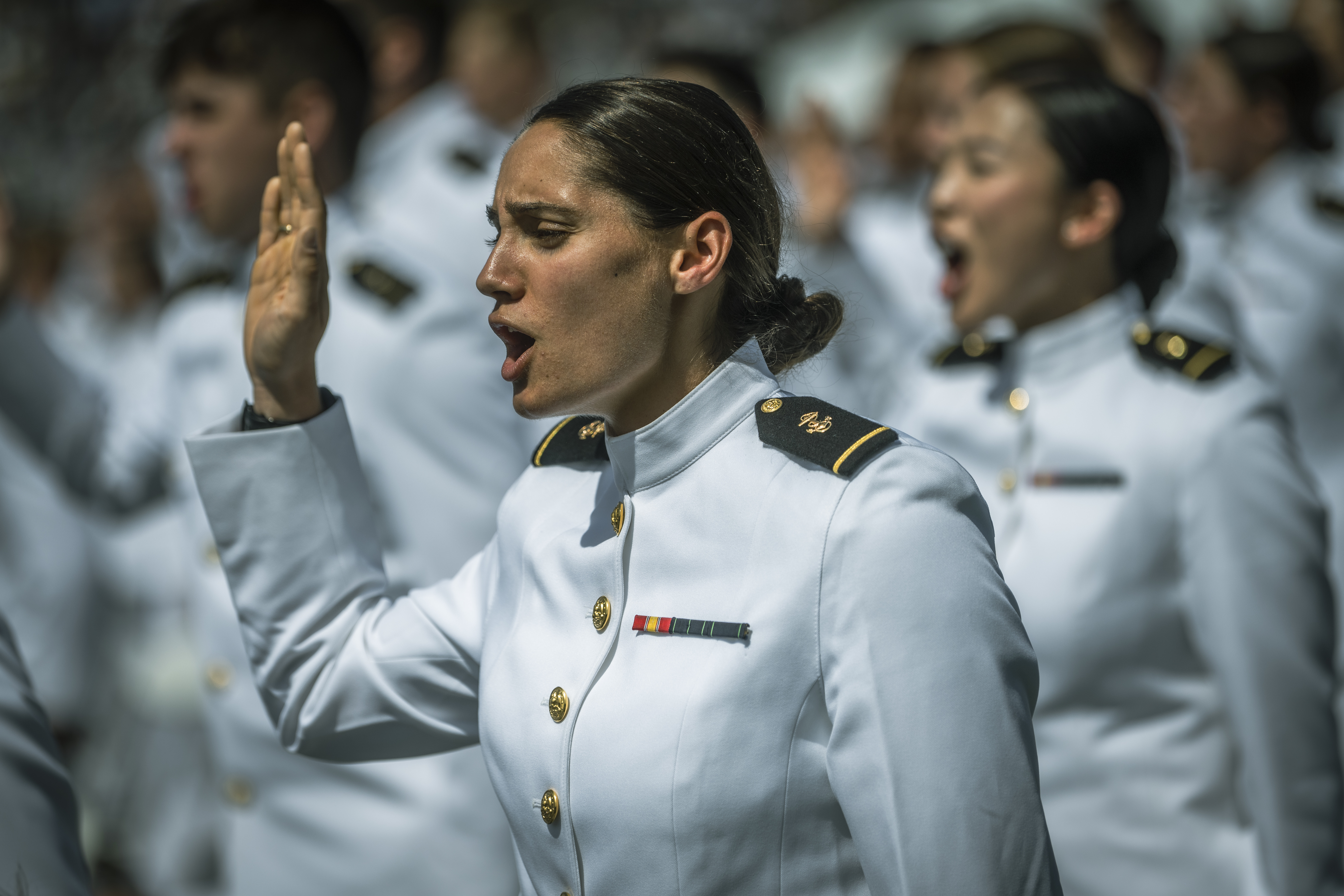 Newly commissioned Navy ensigns take oath of office during Naval Academy’s Class of 2023 graduation ceremony at Navy–Marine CorpsStadium, Annapolis, Maryland, May 26, 2023 (DOD/Chad J. McNeeley)